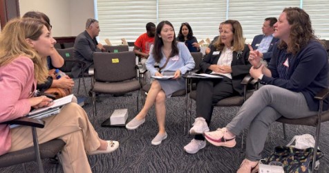 group of people in classroom setting