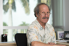 Lawrence Toll in office setting  (Photo by Alex Dolce)