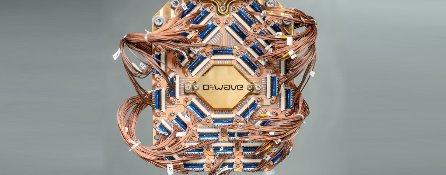 pink, red, purple, and yellow colored chip with words 'D-Wave' 'advantage2'