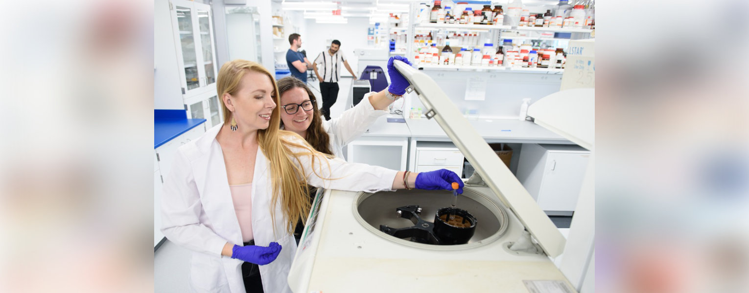 On the left, Bethany A. Stanhope, Ph.D., principal investigator and executive director of academic operations at FAU’s John D. MacArthur Campus, with Allison Walsh, an FAU neuroscience doctoral student. (Photo by Alex Dolce)