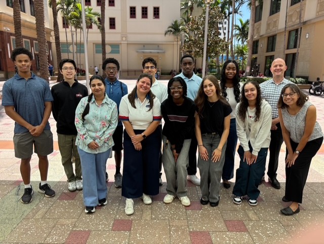 Group of students and mentors outside