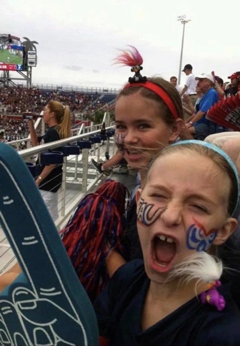 Amber and Jade Muller at an FAU football game in 2011.