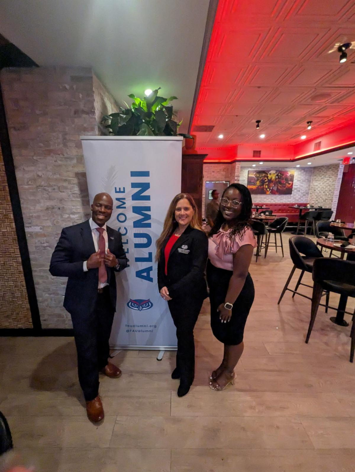 Dean Luna and others smiling for a photo