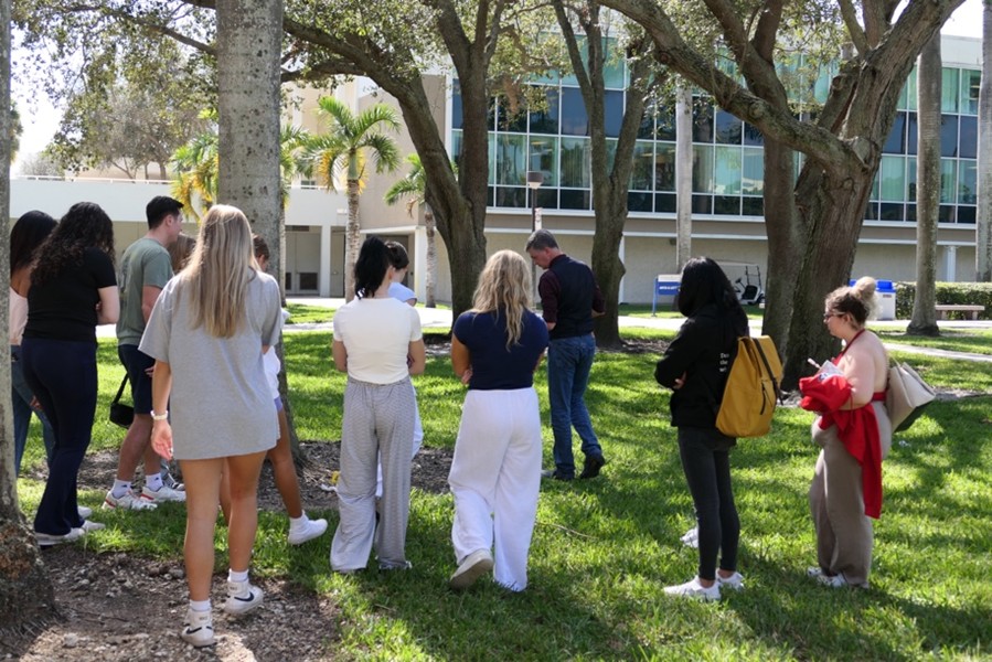 Group of students learning forensic mapping and documentation processes
