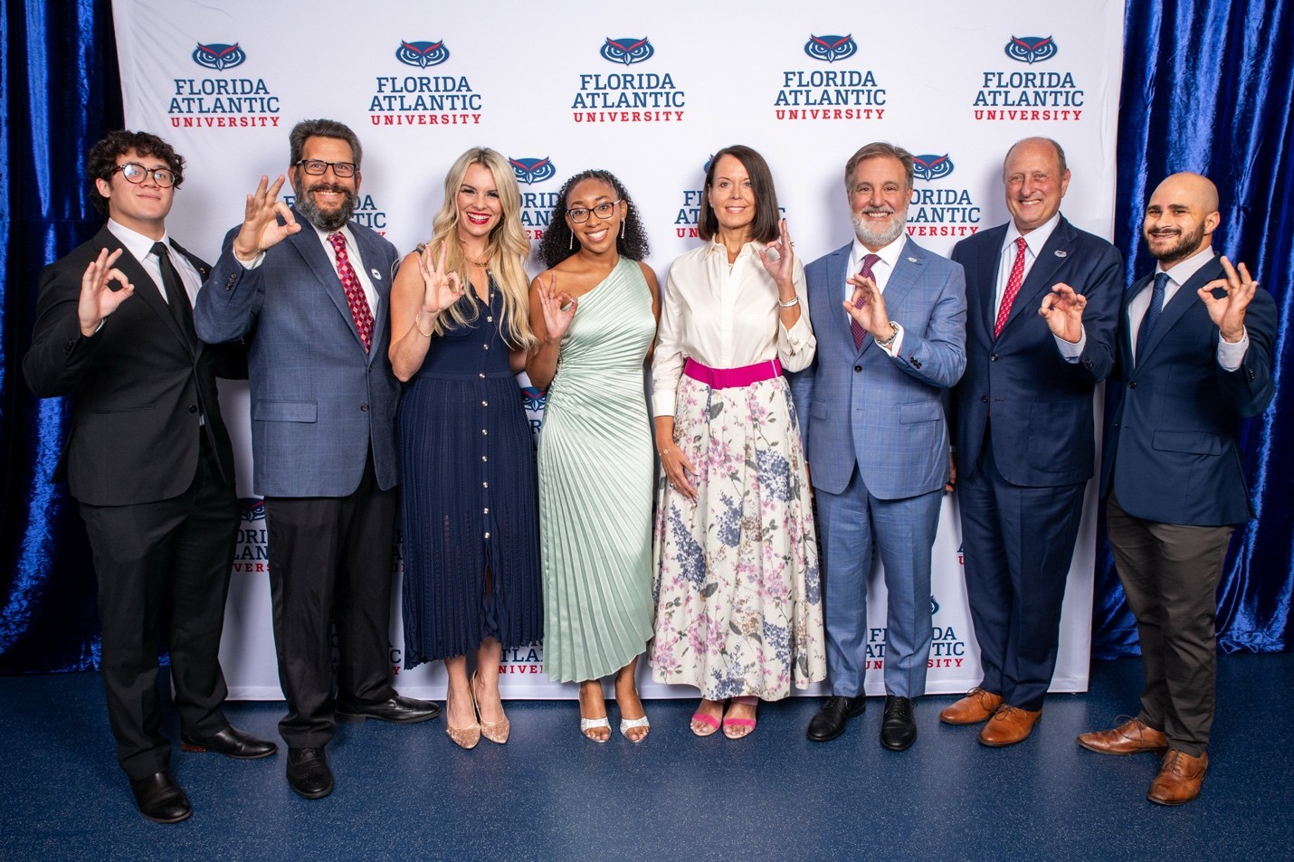 Grant (center) with (L-R) Larry Faerman, Ph.D., vice president of Student Affairs; Katie Burke, Ph.D., assistant vice president of Alumni and Community Engagement; First Lady Jillian Hasner, President Adam Hasner, David Green, interim vice president of Institutional Advancement; and Chris Ferreira, chair of the FAU Alumni Association Board of Directors