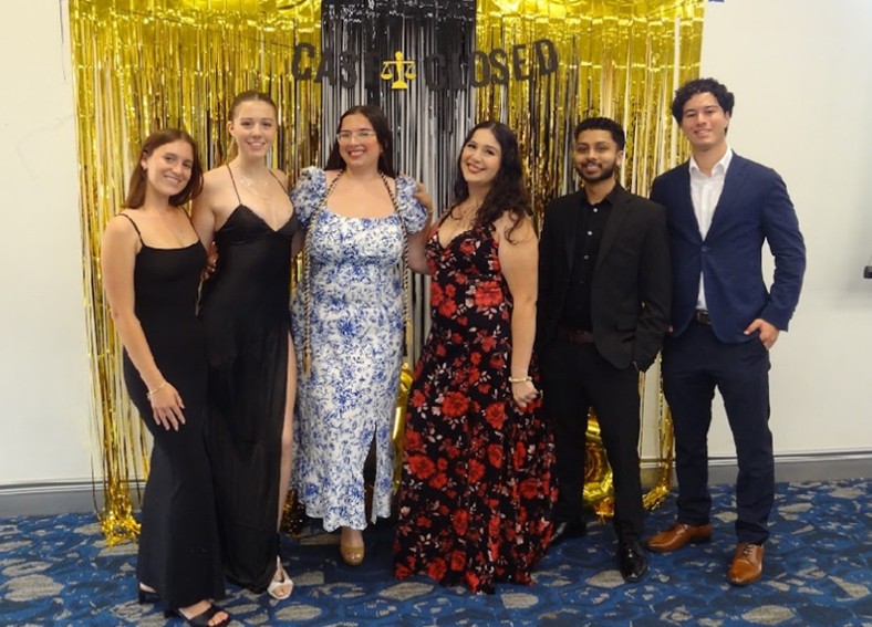 Iacono (center left) with her fellow teammates was awarded the Frank de la Torre Outstanding Leadership Award