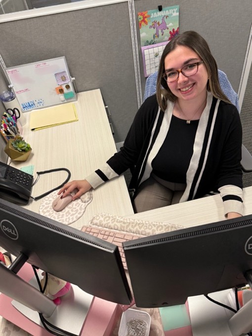 Iacono at her desk within the Demand the Limits firm headquarters