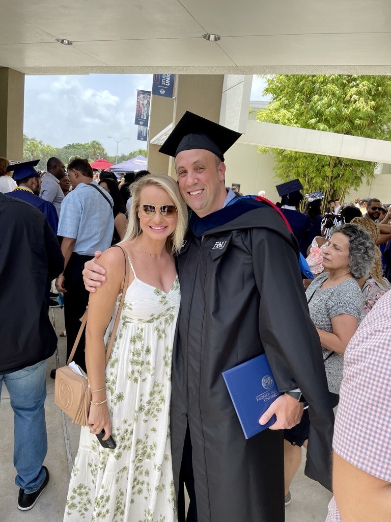 Alexa and Craig Robinson at his 2022 MSW Graduation Ceremony