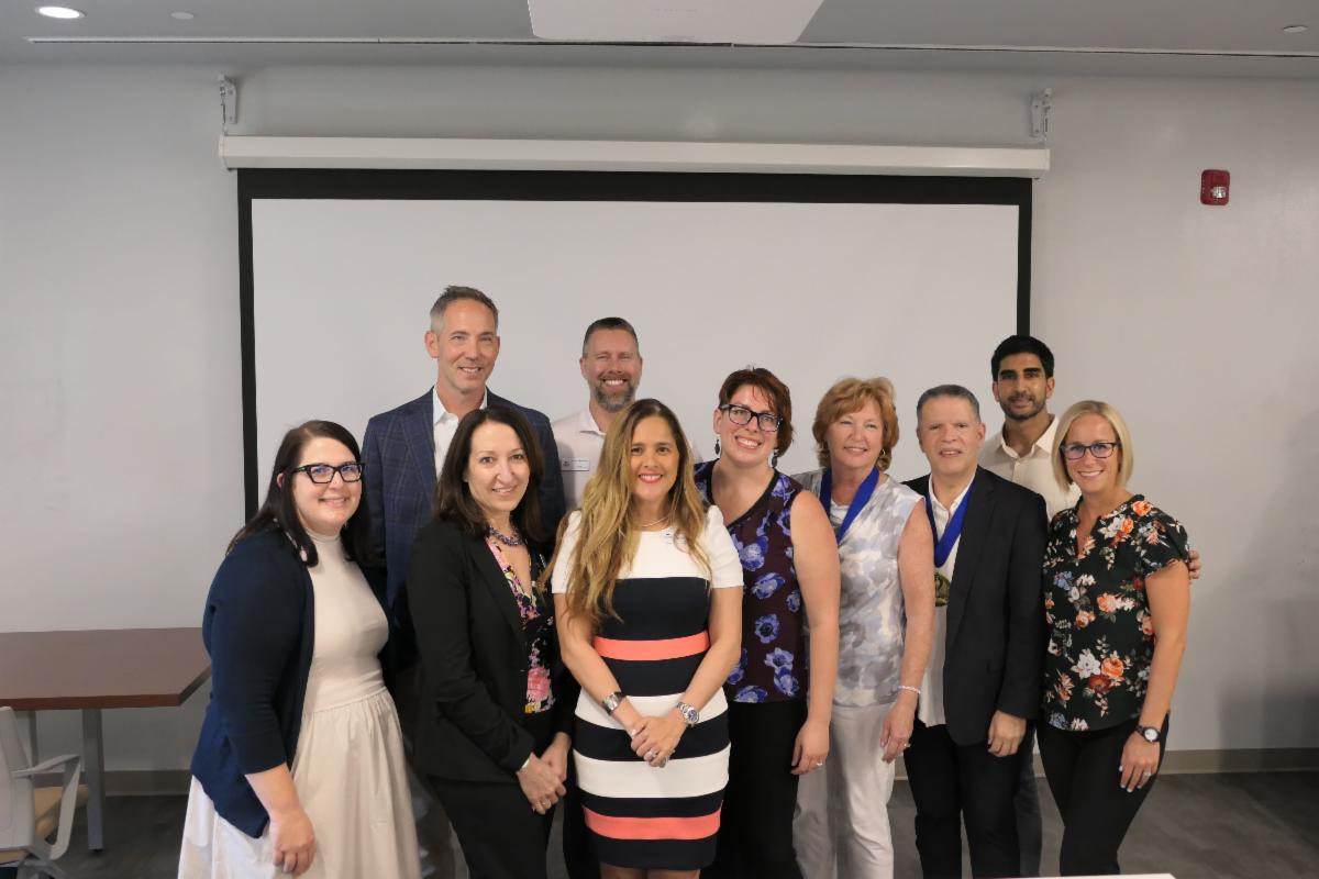 L-R: Morgan Cooley, David Simpson, Wendy Guastaferro, Ryan Meldrum, Dean Naelys Luna, Dani Groton, Donna Drucker, Manny Gonzalez, Sameer Hinduja, and Cassandra Atkin-Plunk