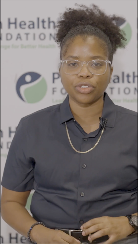 Image of Samira speaking in her video