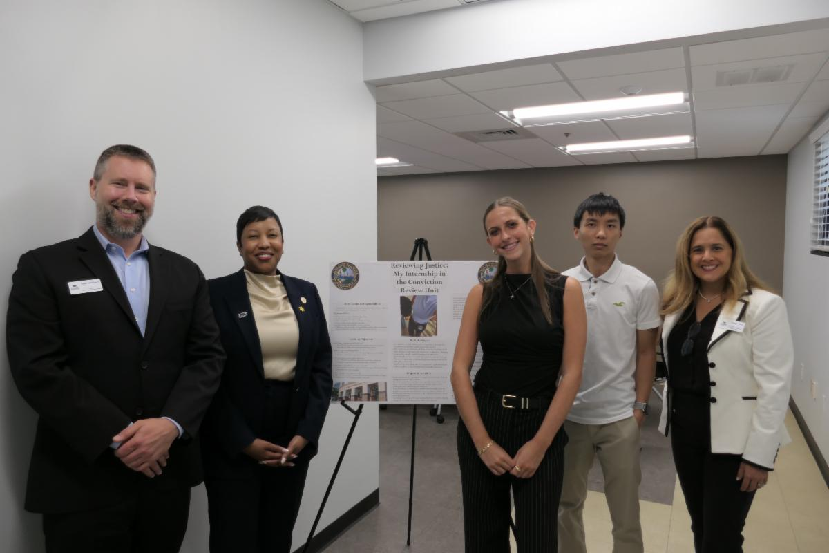 Group of people smiling for a photo