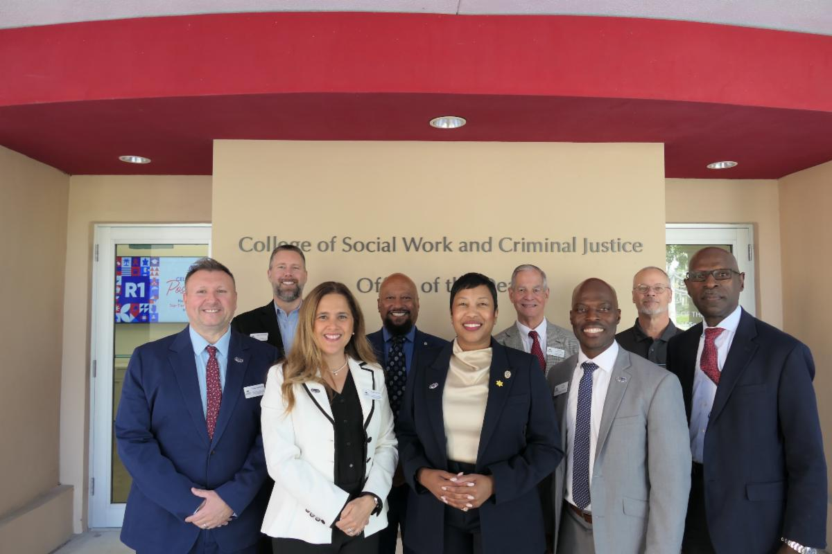 Group of people smiling for a photo