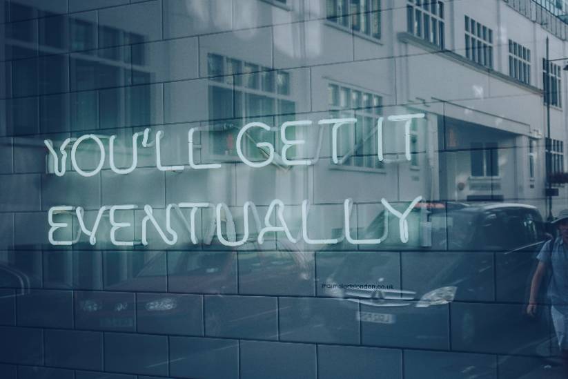 neon sign that says "you'll get it eventually"