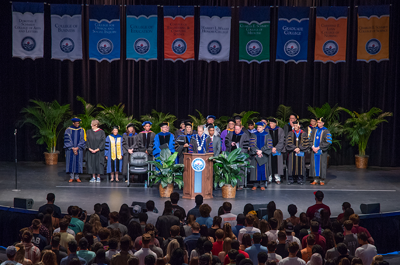 Faculty on stage during freshman convocation