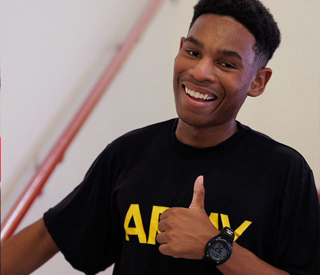 Staircase challenge young man giving the thumbs up