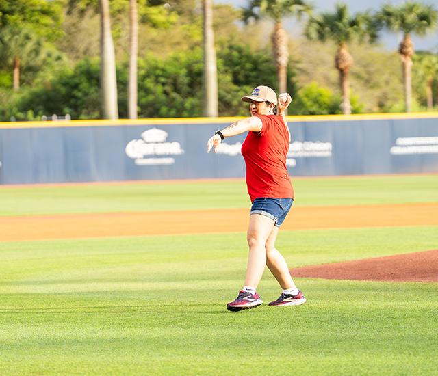 Florida Atlantic grad throwing the first pitch